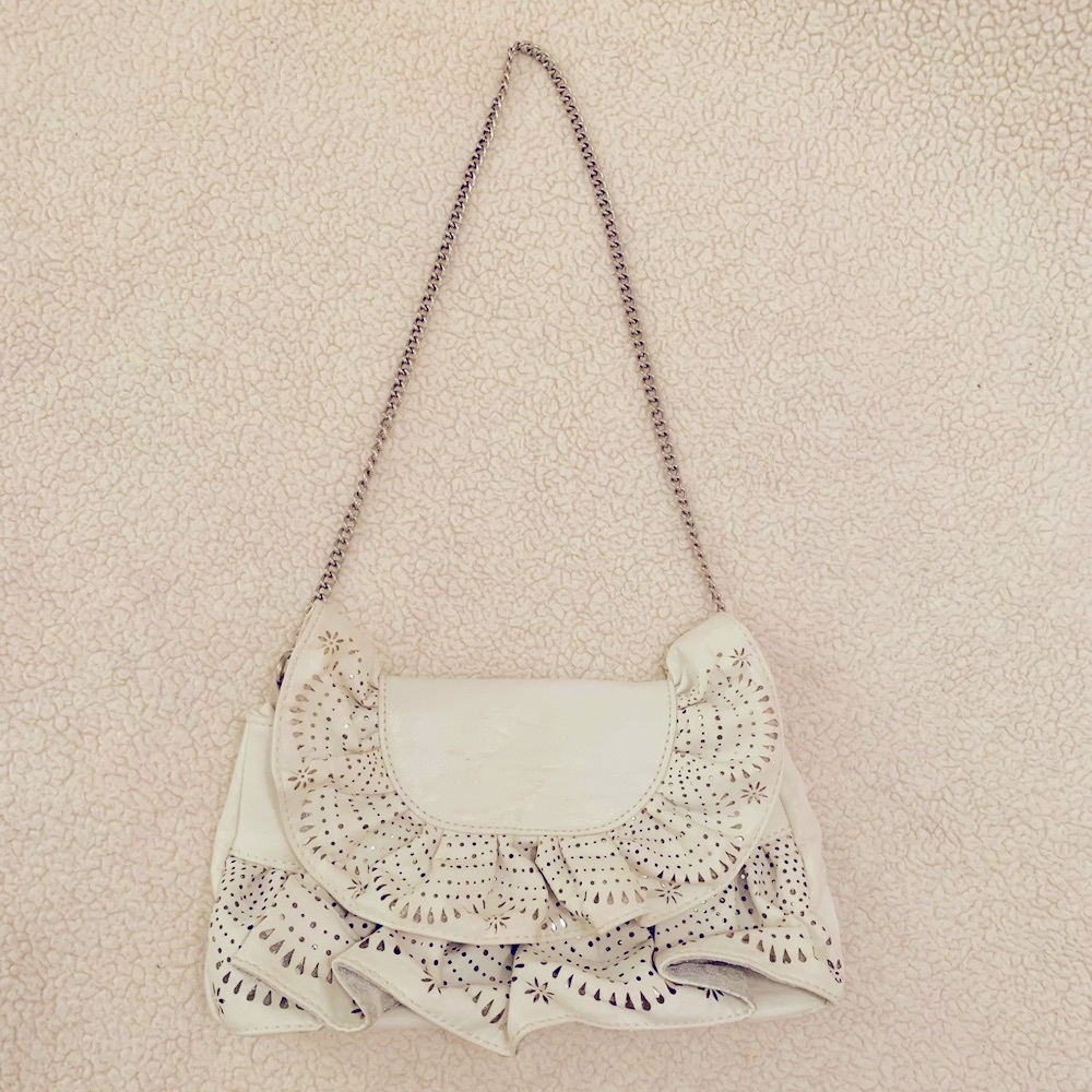 Leather bag with heavy silver chain